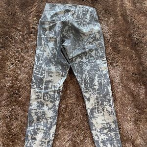 Gray legging with shining silver detail. Worn a handful of times.